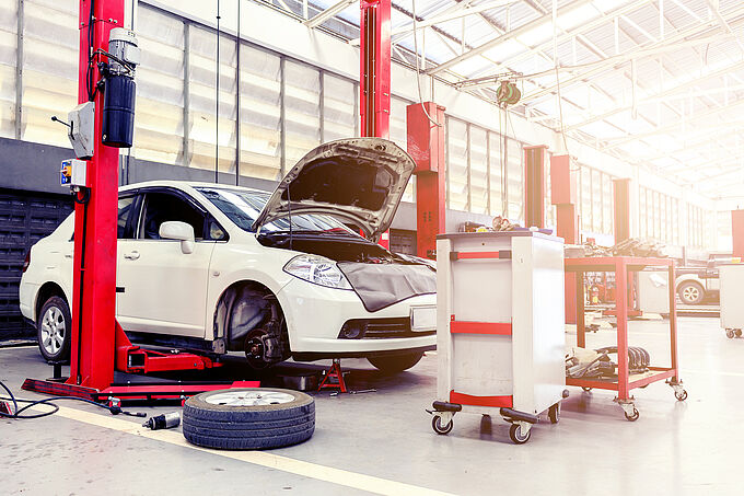 car repair station with soft-focus in the background and over sunlight car repair station with soft-focus in the background and over sunlight
